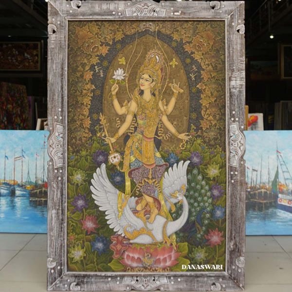 Dewi Saraswati, the embodiment of wisdom and artistry. This painting captures her serene presence, surrounded by the melodies of knowledge and creativity. A tribute to the eternal muse who inspires the pursuit of learning and the beauty of expression Dewi Saraswati-DSW4-1279