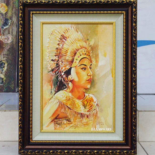Adorn your space with the serene beauty of this Balinese Girl Painting. Hand-painted with intricate details and vibrant colors, this art piece captures the essence of Bali's rich culture and traditional artistry. The gentle gaze of the Balinese girl depicted in the painting is sure to create a peaceful ambiance in any room. Add a touch of exotic charm to your home décor with this stunning piece of Balinese art. Perfect for art lovers and collectors alike, this painting makes a unique and eye-catching addition to any art collection. Balinese Girl Painting-DSW4-1270